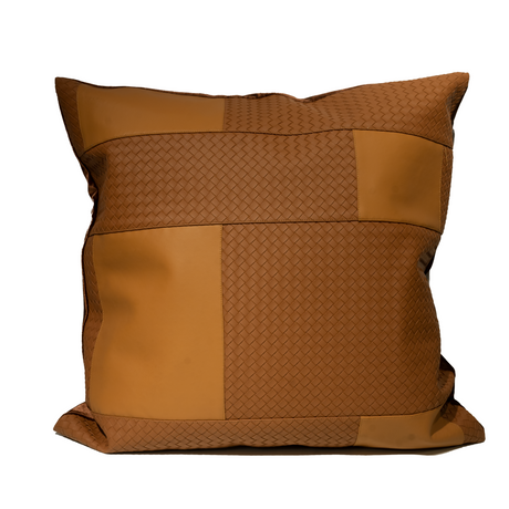 Brown pillow with woven pattern on a white background