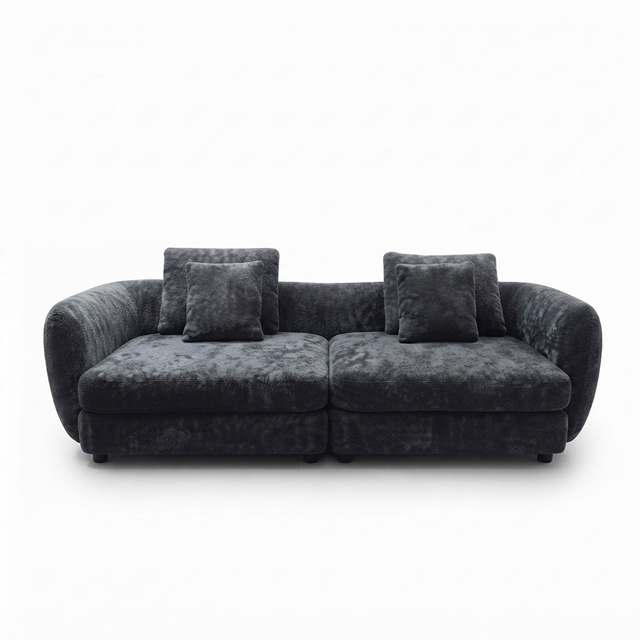 A modern two-seater sofa upholstered in a dark charcoal gray textured fabric, featuring two matching square throw pillows, shown against a plain white background.